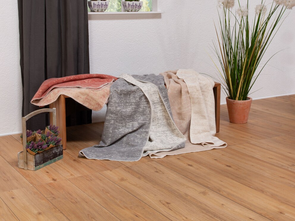 Couverture d'appoint douillette en 44 % laine vierge de mouton et 56 % coton bio