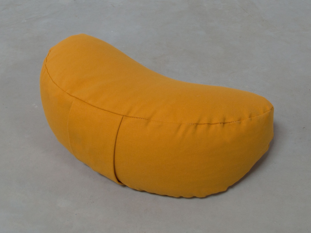Coussin en demi-lune avec boucle de transport