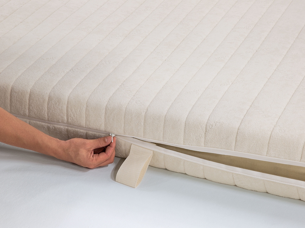 Fermeture à glissière sur tout le pourtour pour retirer la housse du matelas pour l'entretien