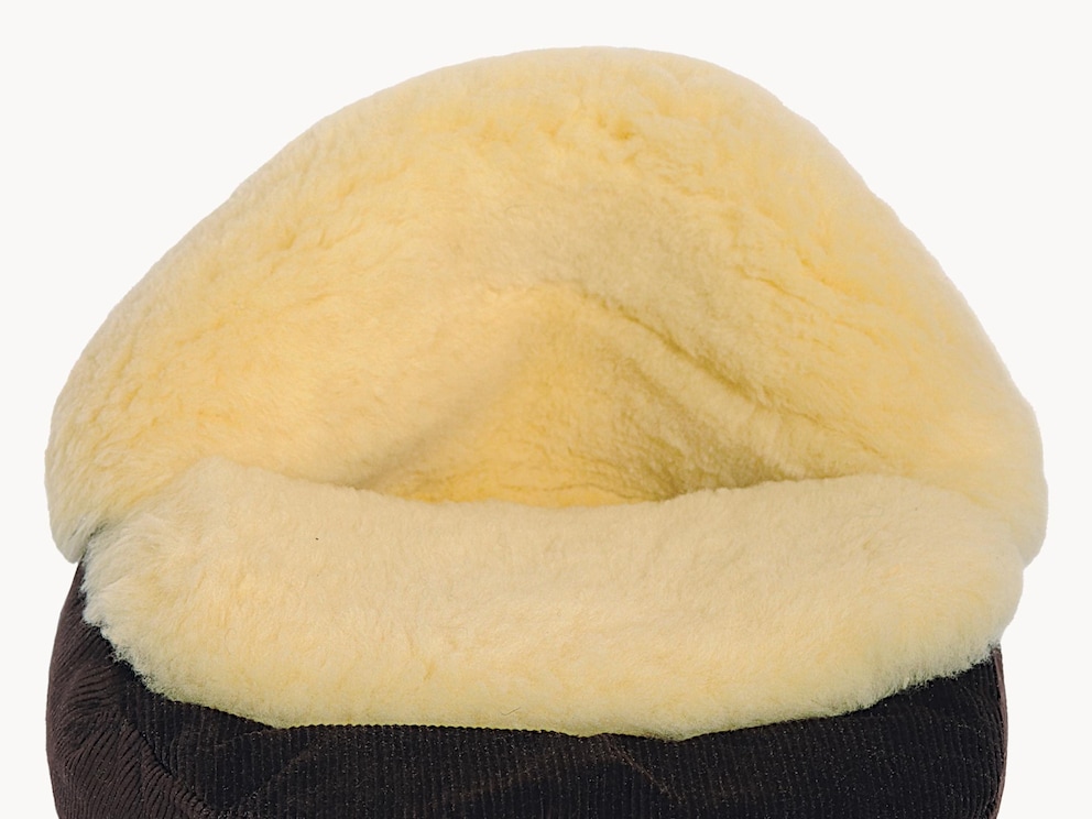 De omslagen van vacht maken indien gewenst van uw voetenwarmer een laars