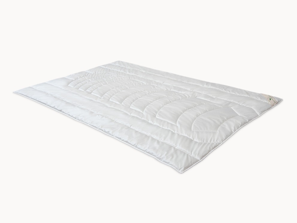 Innovatief doorgestikte lichaamszones met tijk van fijndradig edelsatijn
