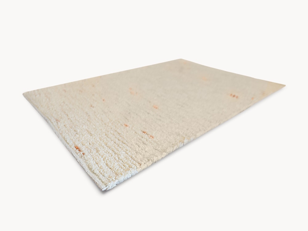 Tapis en laine vierge tissé à la main Alaska avec effets multicolores