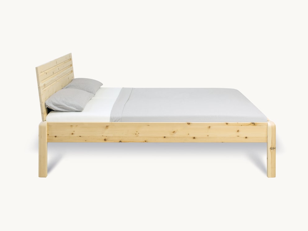 Massief houten bed Pino met ronde bedbodem - zijaanzicht
