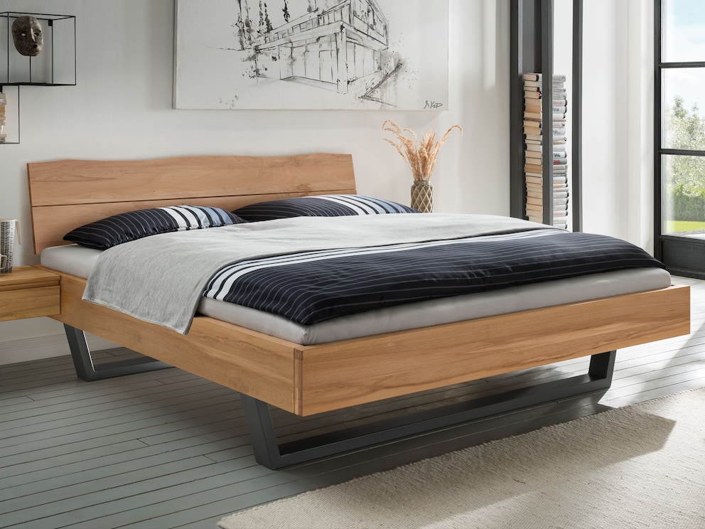 Zwevend bed Legna brengt lichtheid in uw slaapkamer, hier in levendig kernbeuken