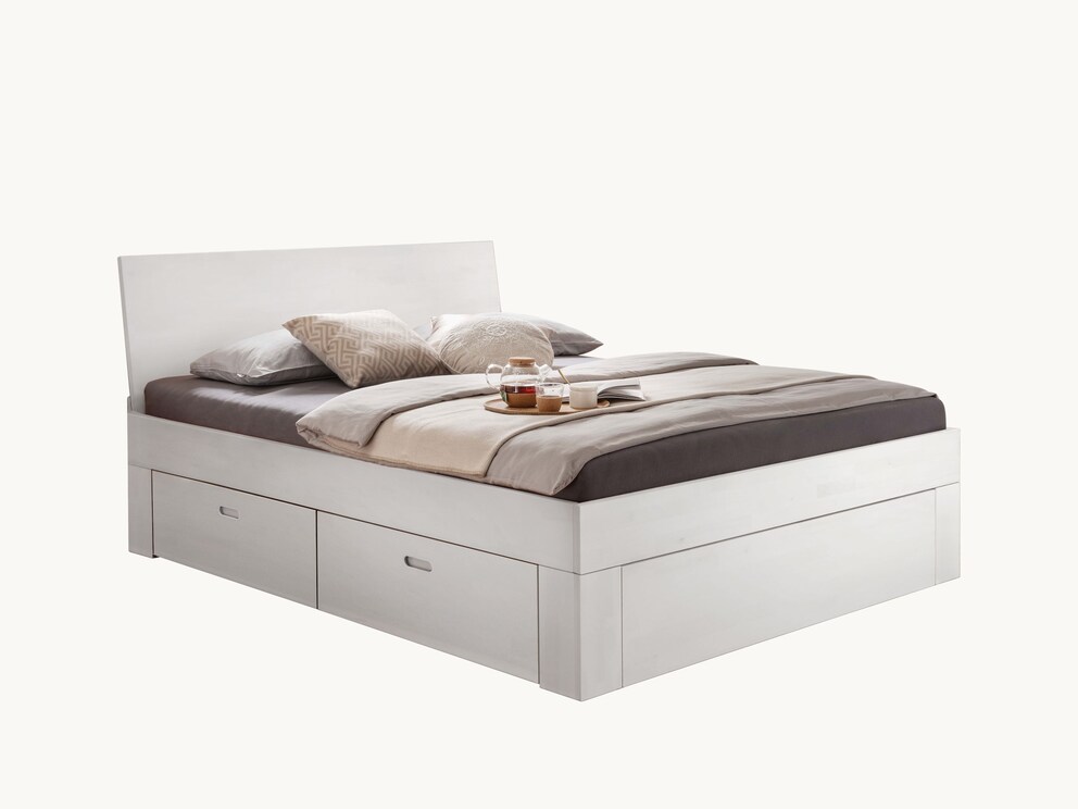 Le lit en hêtre blanc avec tête de lit continue