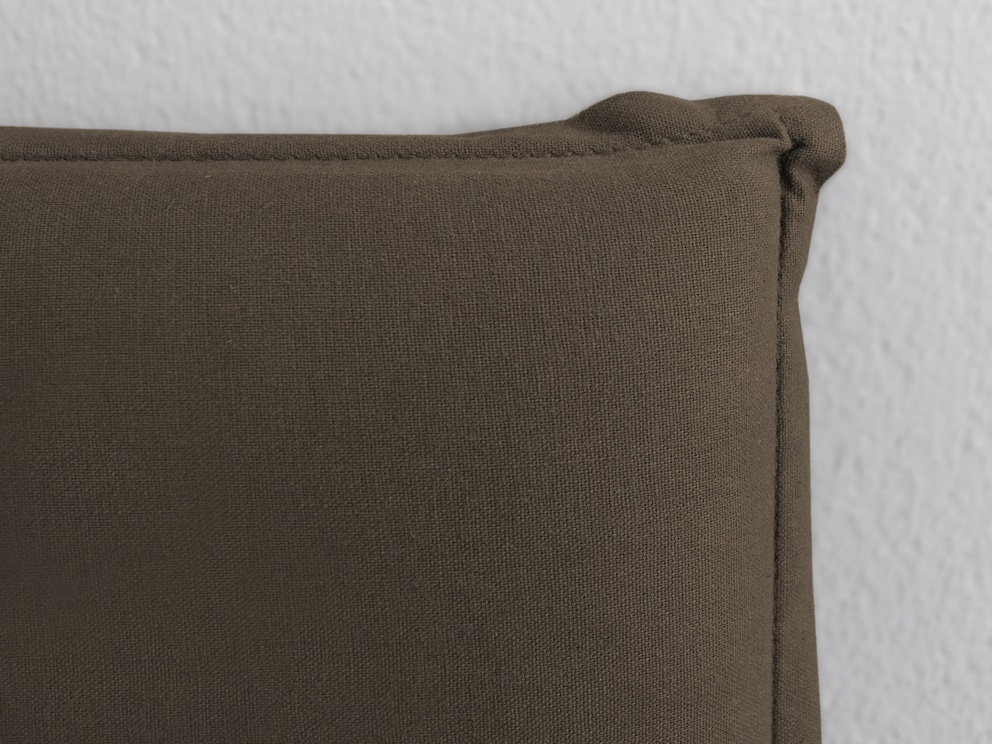 Hier de edele, naturelkleurige linnen bekleding in detail