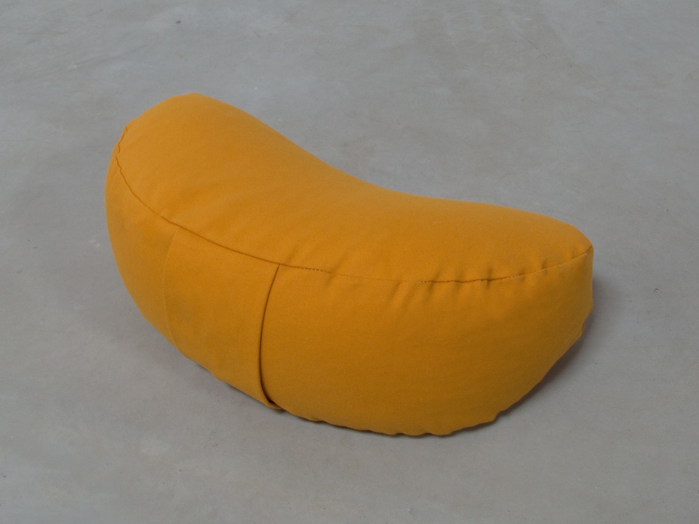 Coussin en demi-lune avec boucle de transport