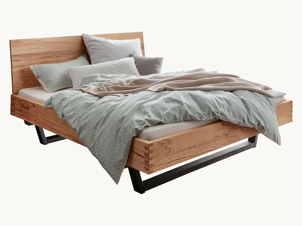 Modernes Schwebebett ganz ohne Metall - hier in eleganter Kernbuche