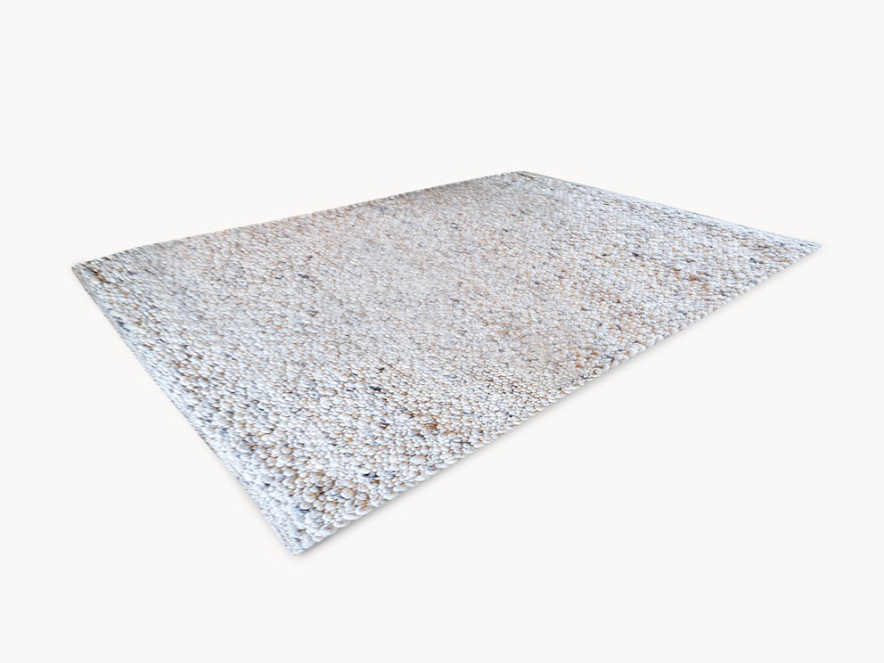 « Ciotto » est un tapis de bien-être merveilleusement doux - ici en couleur beige clair/galet