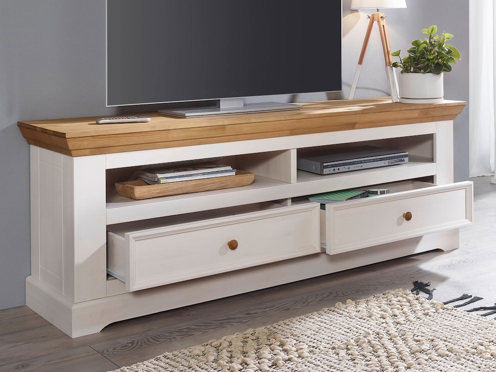 Le lowboard en variante 01 offre 2 tiroirs et 2 compartiments pour appareils avec sortie de câbles