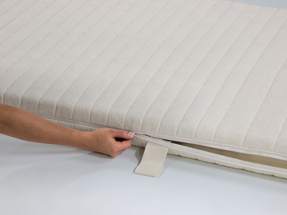Fermeture à glissière sur tout le pourtour pour retirer la housse du matelas pour l'entretien