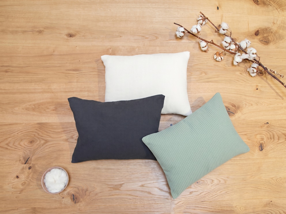 Le coussin de voyage est disponible en coton bio