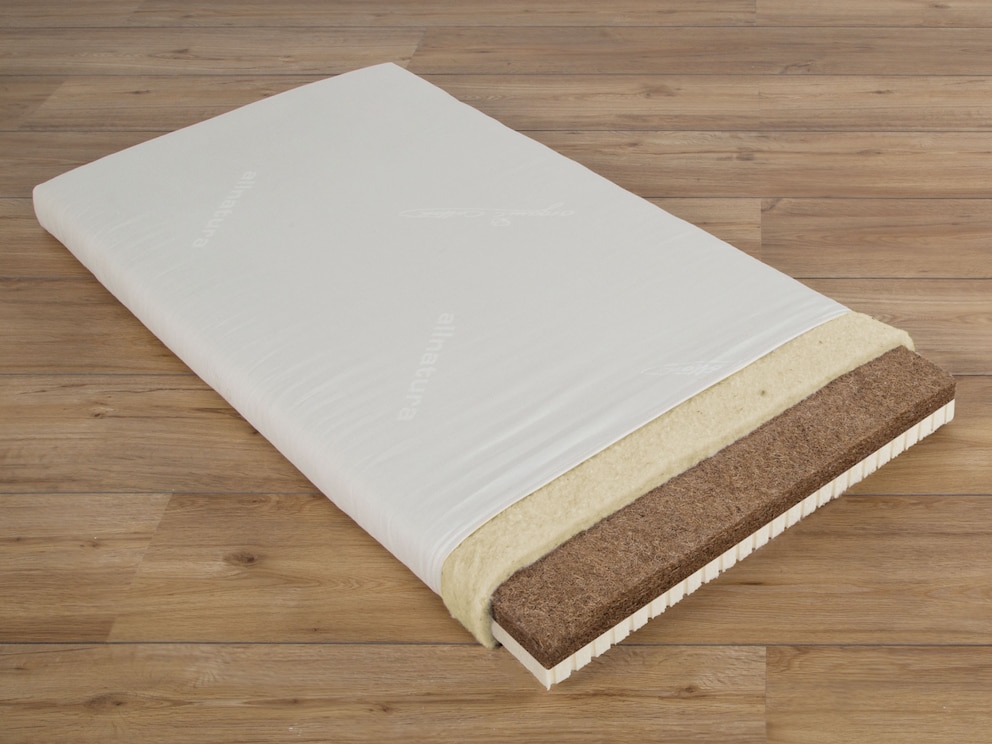 Stevig-elastische zijde van gelatexeerde kokosvezels - precies goed voor uw baby