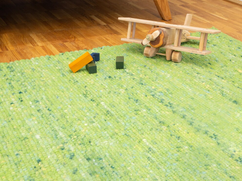 Le tapis de laine vierge non enduit est réversible