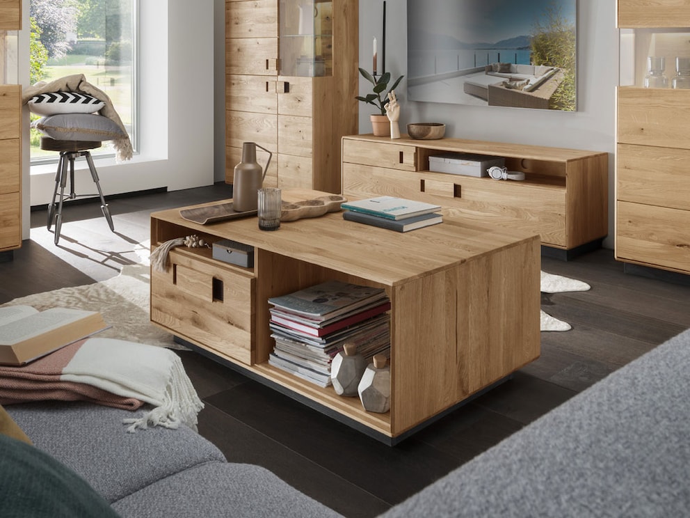 Table basse noble et rustique avec poignée astucieuse et beaucoup d'espace de rangement