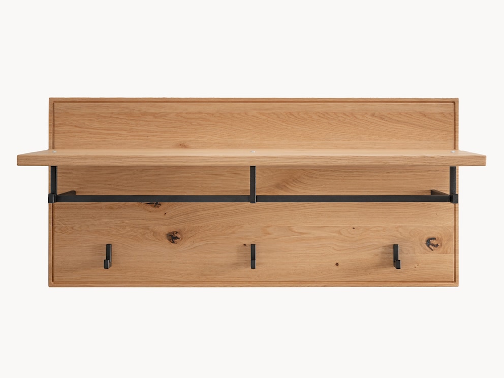 De achterwand en hoedenplank zijn gemaakt van massief wildeikenhout met een levendige nerf