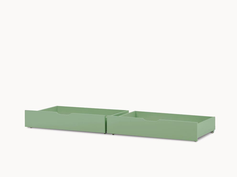 Die optionalen Schubkästen haben Rollen und passen unter das umgebaute Kinderbett, hier in Grün
