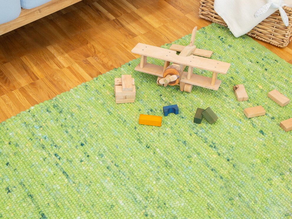 Handgeweven vloerkleed van scheerwol voor je knusse huis - hier in de kleur klavergroen