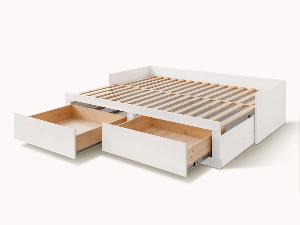Bett in weiß mit raffiniertem Auszieh-System für Matratze und Schubkästen