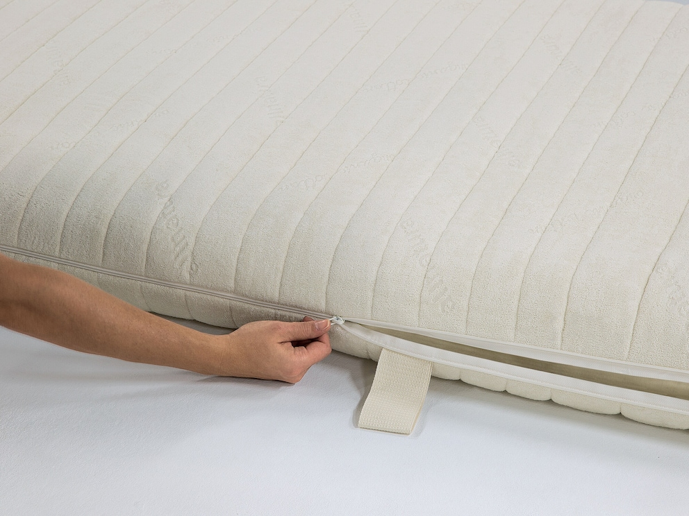 Fermeture à glissière sur tout le pourtour pour retirer la housse du matelas pour l'entretien
